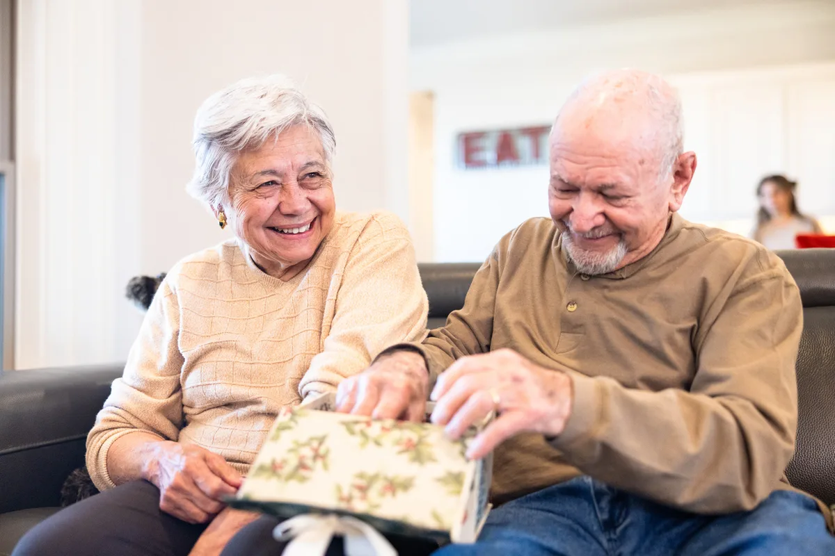 assisted living and memory care residents opening memory boxes